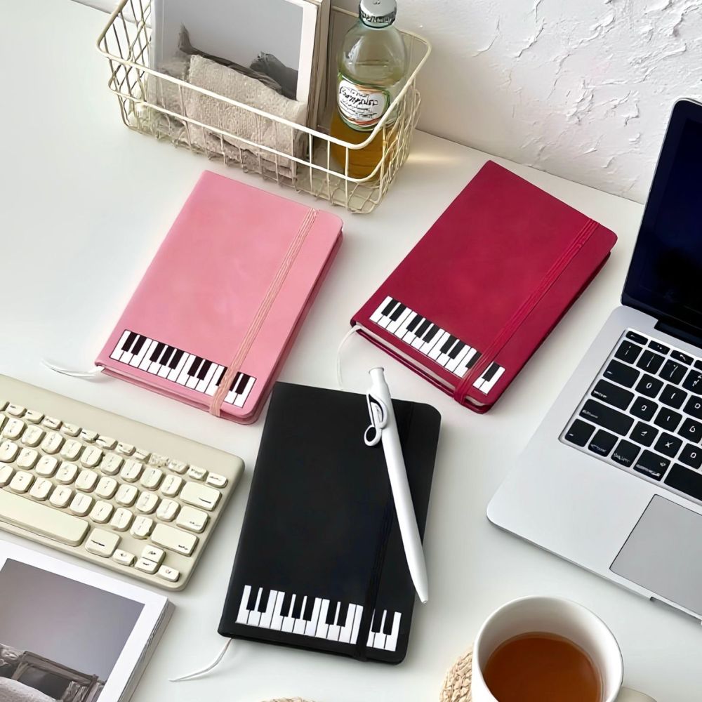 Muziekthema notitieboekje Pian - Blank Sheet Music Notebook recensie en prijs